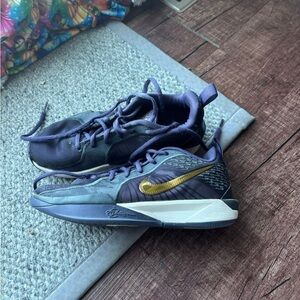 Nike Dark Purple and Gold Athletic Shoes